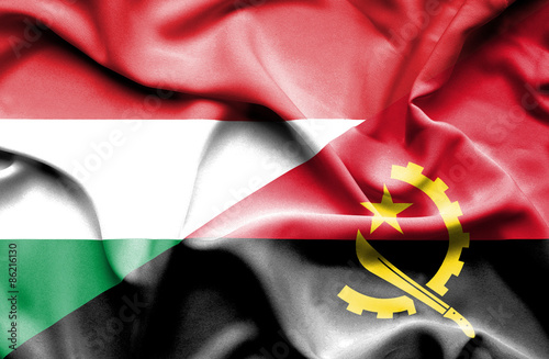 Waving flag of Angola and Hungary