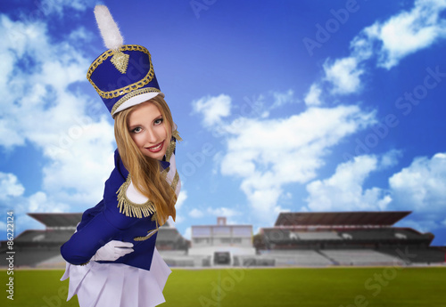 beautiful blond woman  cheerleade majorette drummer isolated on white background 