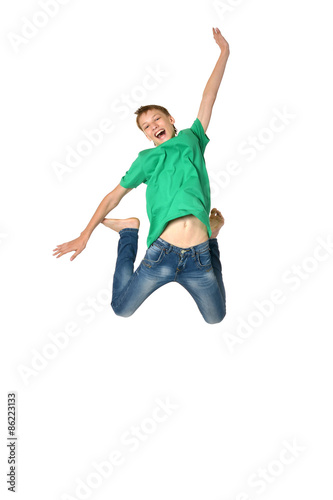 Young boy jumping 