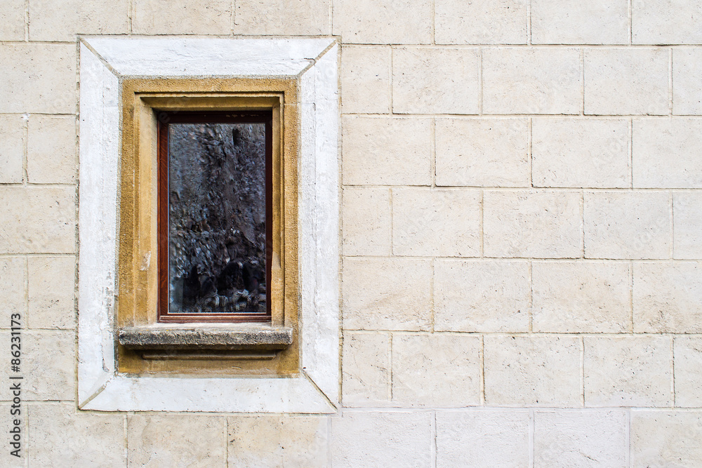 uncared and crooked wall with old window uncared and crooked wall with old window