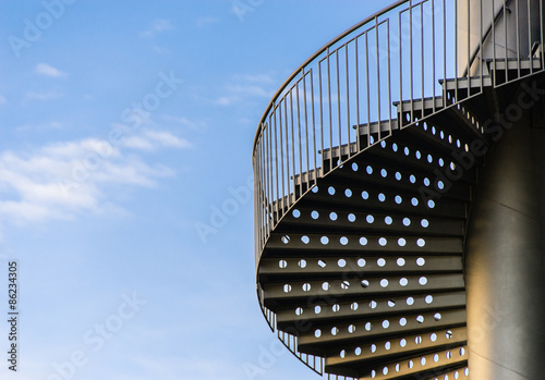 Spiral ladder to the blue sky
