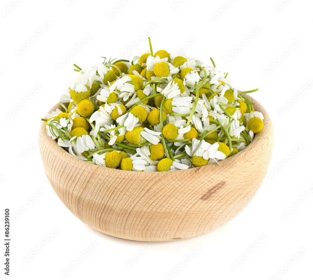 chamomile flowers in a bowl