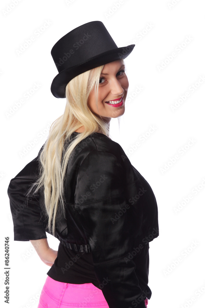 Attractive woman wearing a black jacket, pink pants and a top hat Attractive woman wearing a black jacket, pink pants and a top hat