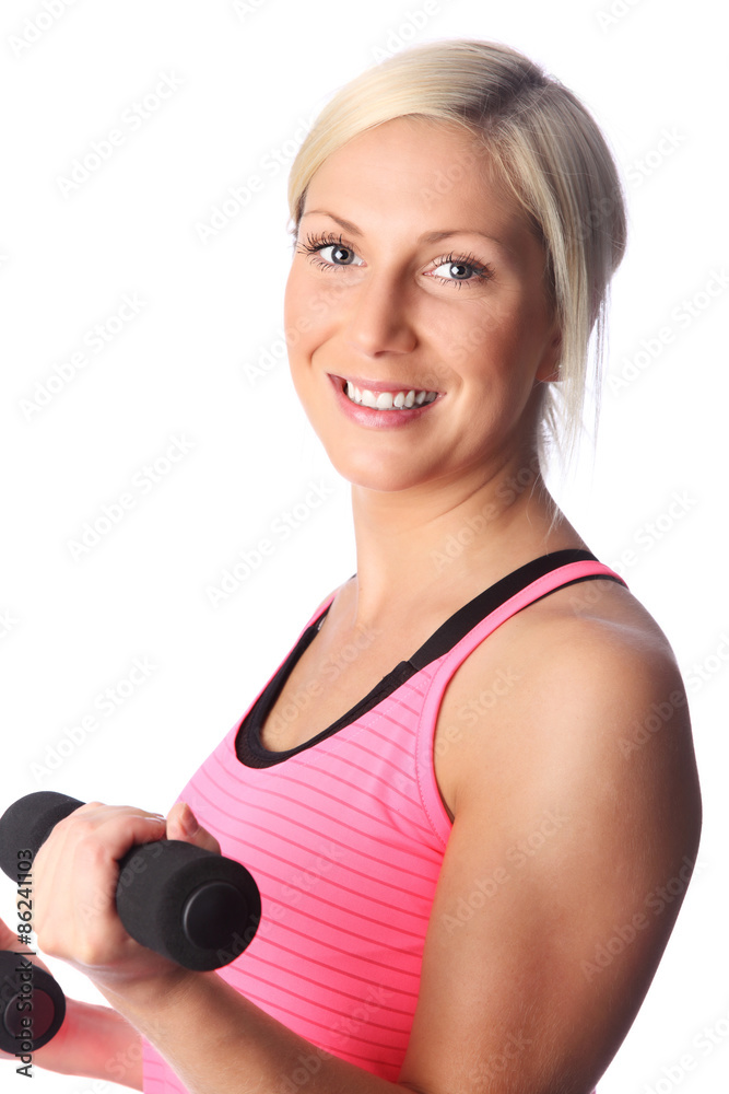 Attractive blonde woman working out in a pink shirt