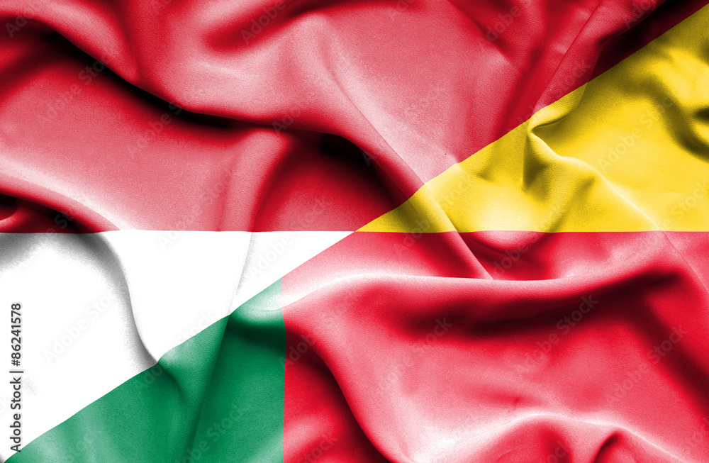 Waving flag of Benin and Indonesia