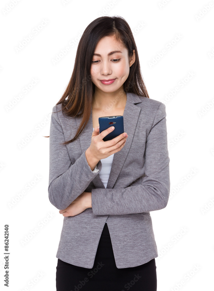 Young businesswoman use of the cellphone Young businesswoman use of the cellphone