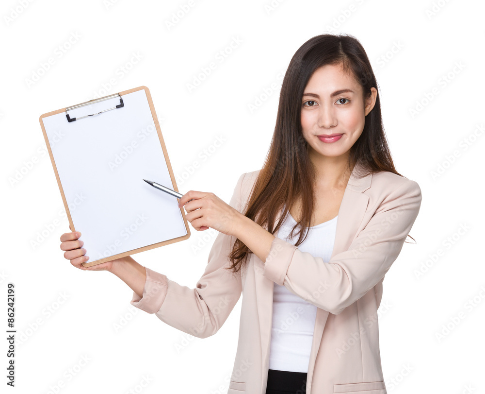 Young businesswoman pen point to clipboard with blank papera