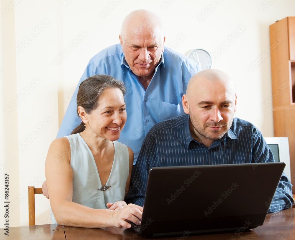 people  at work on  laptop