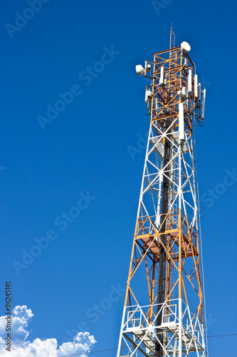 A telecommunication tower and blue sky