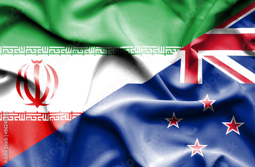 Waving flag of New Zealand and Iran.