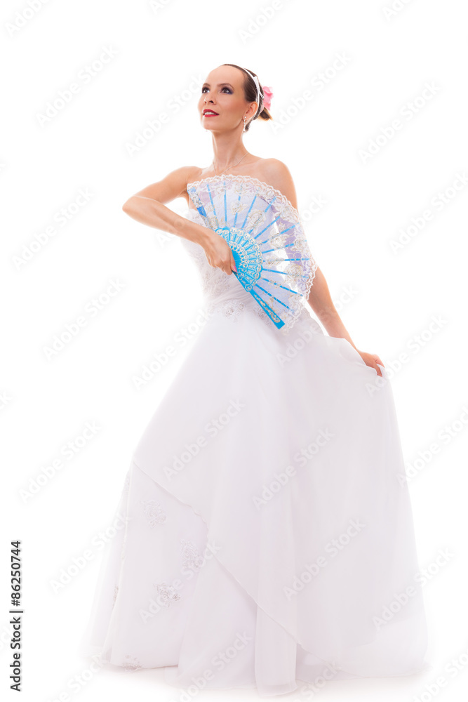 Full length bride in wedding gown holds fan isolated Full length bride in wedding gown holds fan isolated