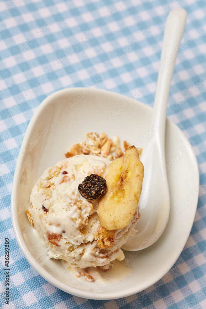 Granola ice cream with cereal and spoon Stock Photo Adobe Stock