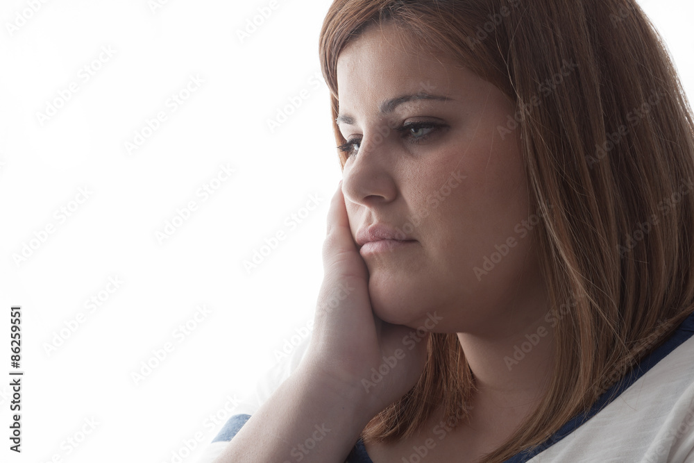 Pensive woman closeup portrait. Backlight. Pensive woman closeup portrait. Backlight.