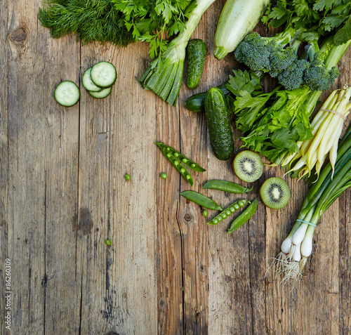 Fototapeta Naklejka Na Ścianę i Meble -  Raw detox green vegetable food set on wood table