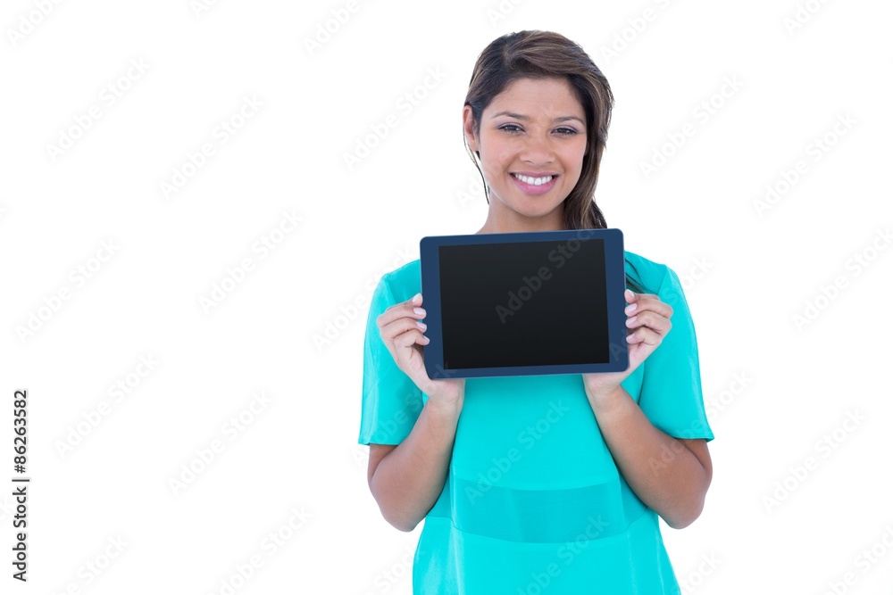 Pretty brunette showing tablet computer Pretty brunette showing tablet computer