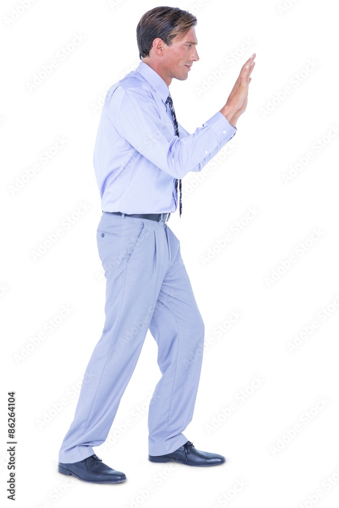 Businessman walking while gesturing with hands Businessman walking while gesturing with hands