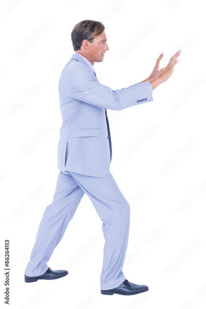 Businessman walking while gesturing with hands Businessman walking while gesturing with hands