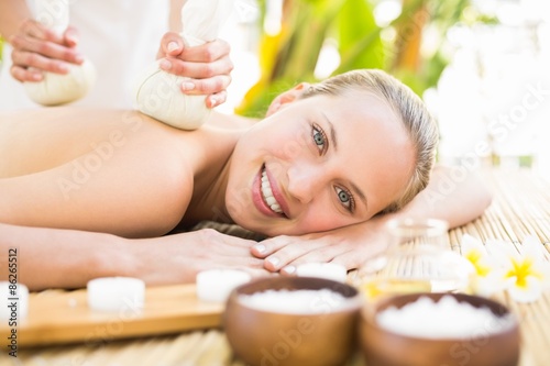 Attractive woman getting massage on her back