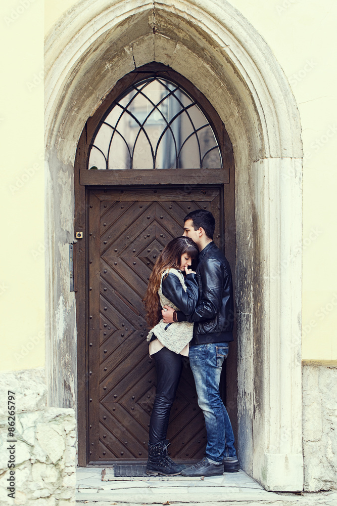 wooden door retro couple hugging