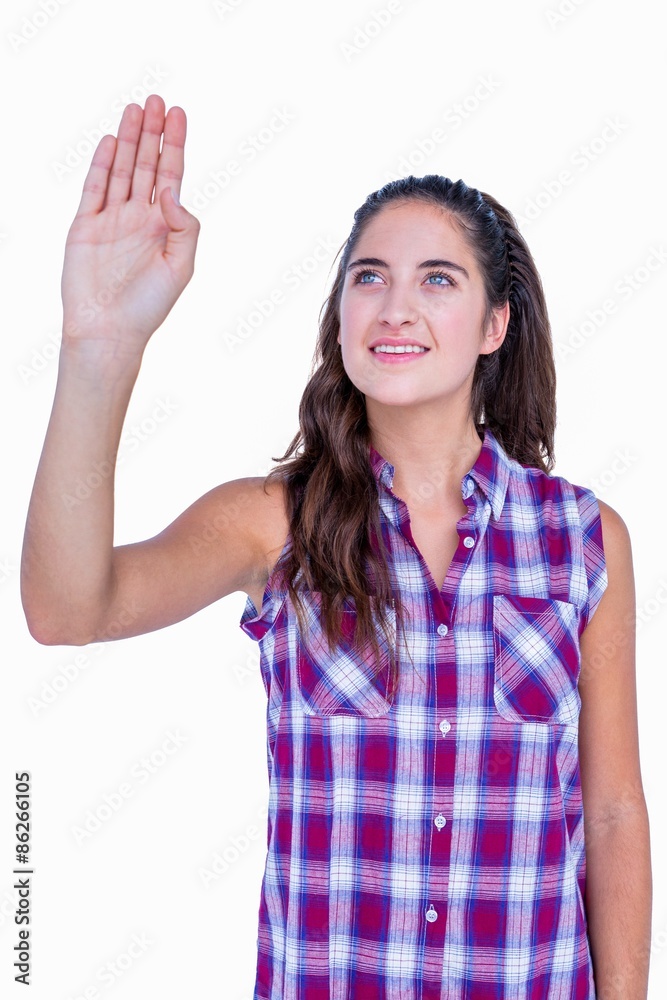 Pretty brunette touching something with her hand Pretty brunette touching something with her hand