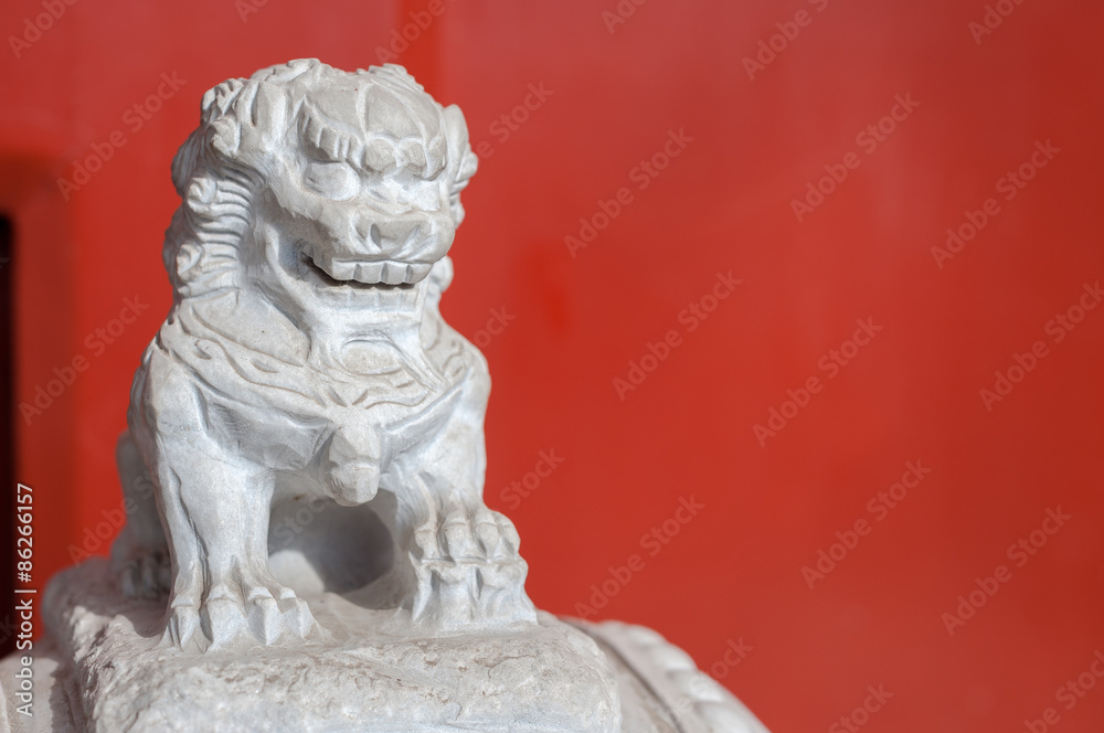 Obraz premium White marble figure outside a residential building, Beijing, China