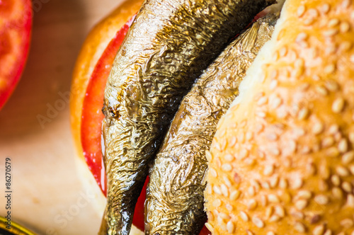 Sardines in burger closeup