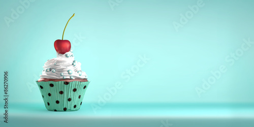 Papier peint Delicious cupcake topped with a cherry with whipped cream and sweeties