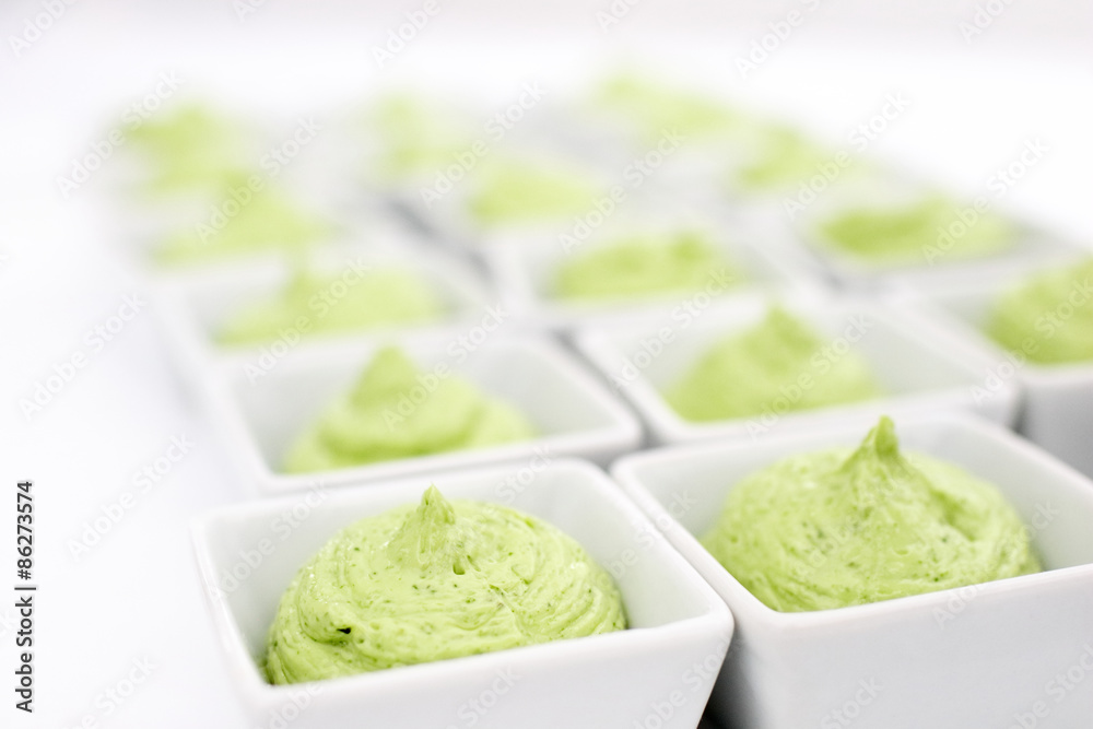 butter mixed with herbs in small plates at the buffet butter mixed with herbs in small plates at the buffet