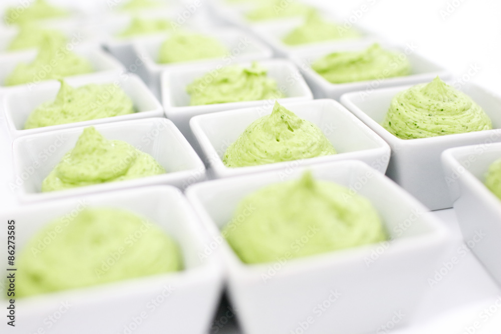 butter mixed with herbs in small plates at the buffet butter mixed with herbs in small plates at the buffet