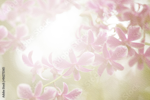 pink orchid on mulberry paper texture for background