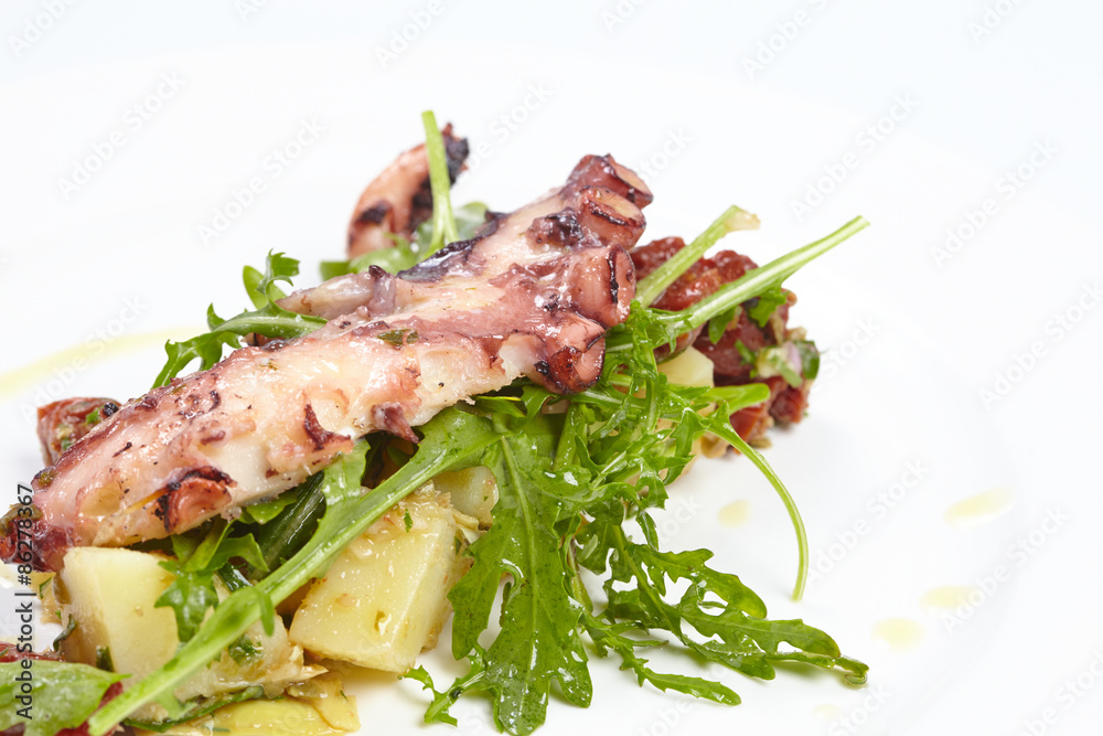 octopus with potatoes, arugula octopus with potatoes, arugula