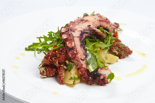 octopus with potatoes, arugula