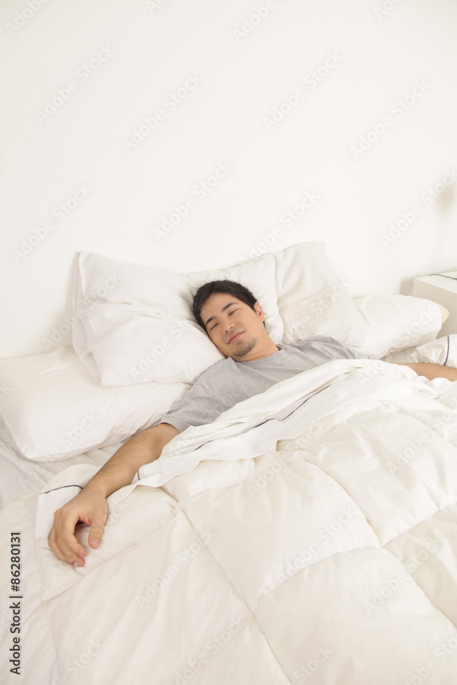 Man resting in his bed Man resting in his bed