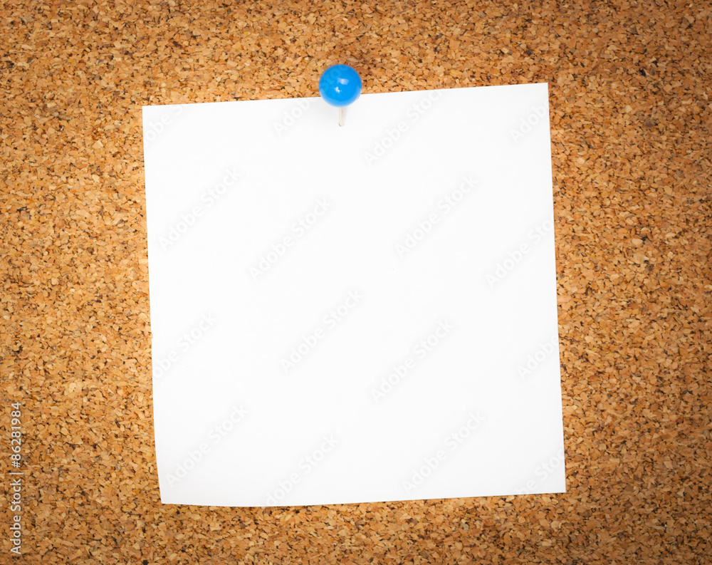 Business card posted on a cork board Business card posted on a cork board