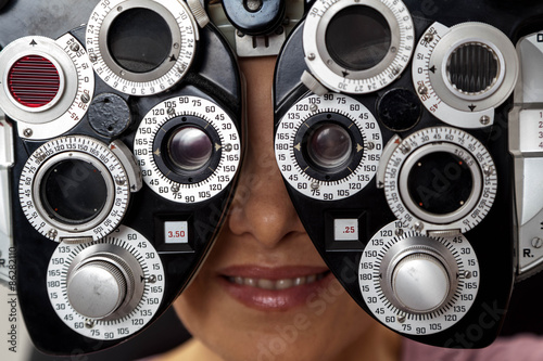 Ophthalmologist performing eye tests