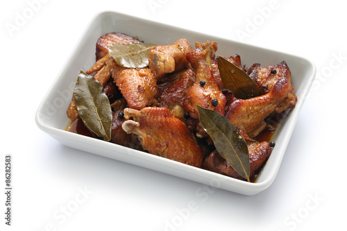 chicken and pork adobo, filipino food isolated on white background photo