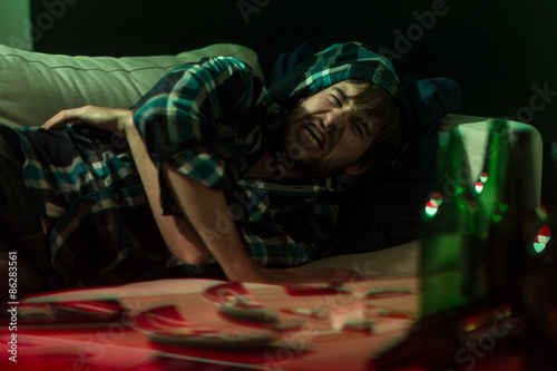 Tableau sur toile Stoned man having hallucinations