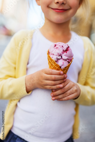 Little girl eating ice cream