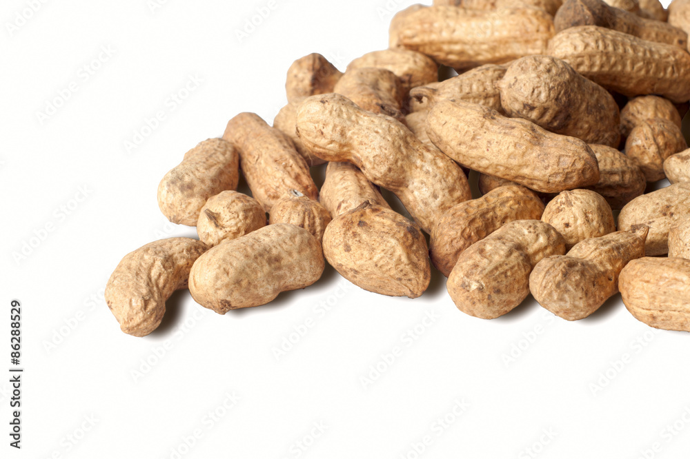 Peanuts heap isolated on white background Peanuts heap isolated on white background