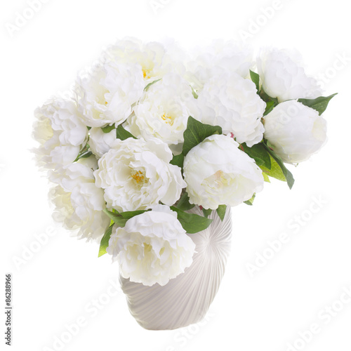 Isolated on white background beautiful bouquet of artificial peonies