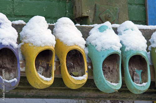 colored wooden shoes om wall