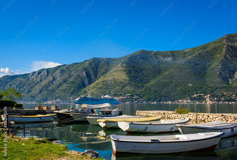 Harbour and boats at Boka Kotor bay (Boka Kotorska), Montenegro, Europe.