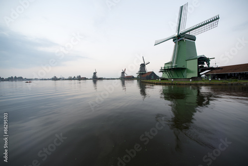 windmills in morning fog the Netherlands, Zaanse Schans