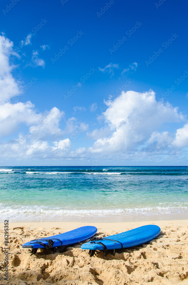 Two Surfboards on the sandy beach in Hawaii Two Surfboards on the sandy beach in Hawaii