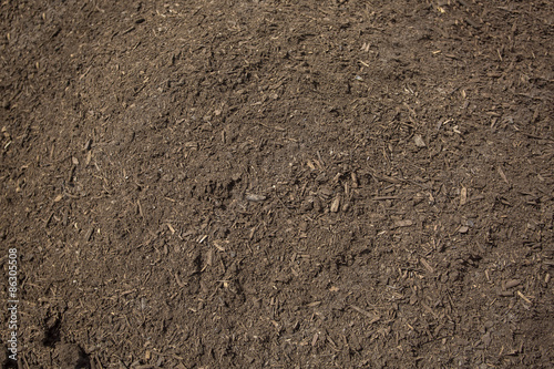 Close up view of rich, healthy compost dirt ready to be put into a garden and help grow healthy vegetables