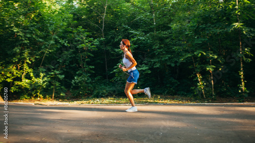 Wallpaper Mural woman running in the park Torontodigital.ca