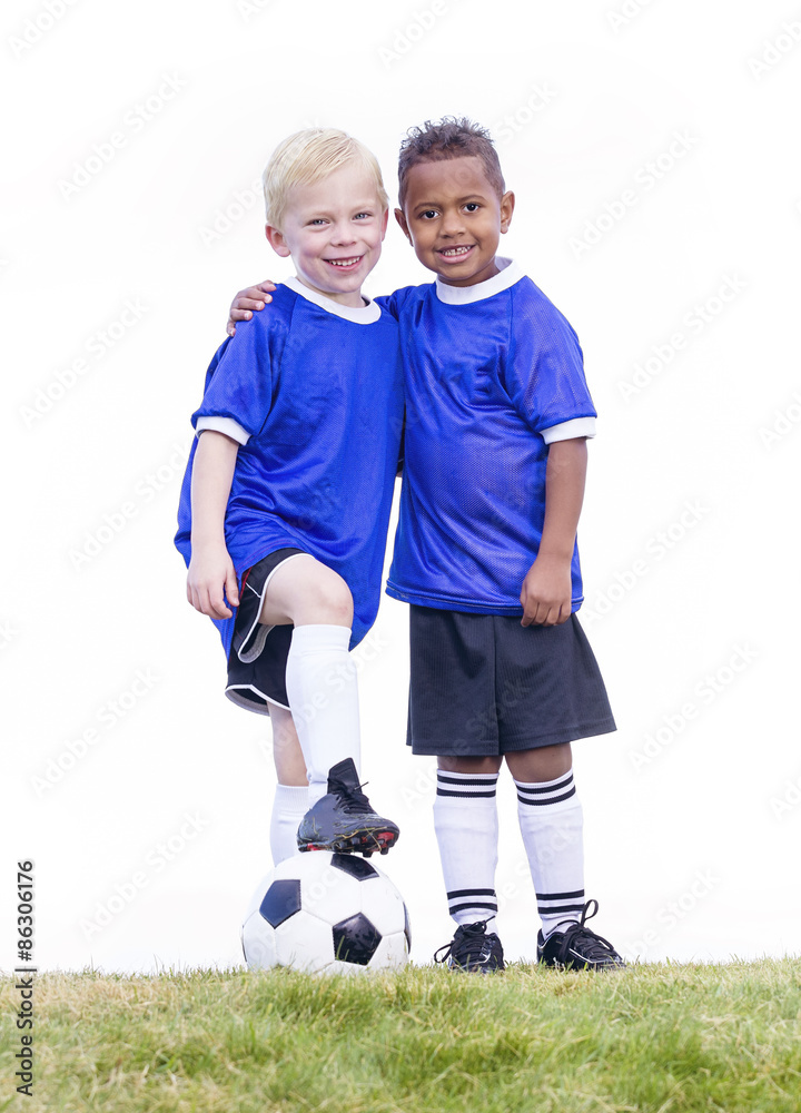 Obraz premium Two diverse young soccer players on white background. Full length view of two youth recreation league soccer players.
