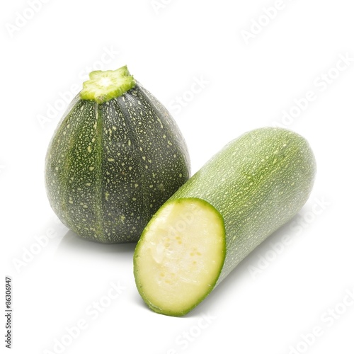 green zucchini isolated on white background