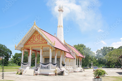 Foto Crematorium with cloud and blue sky background in Thailand.