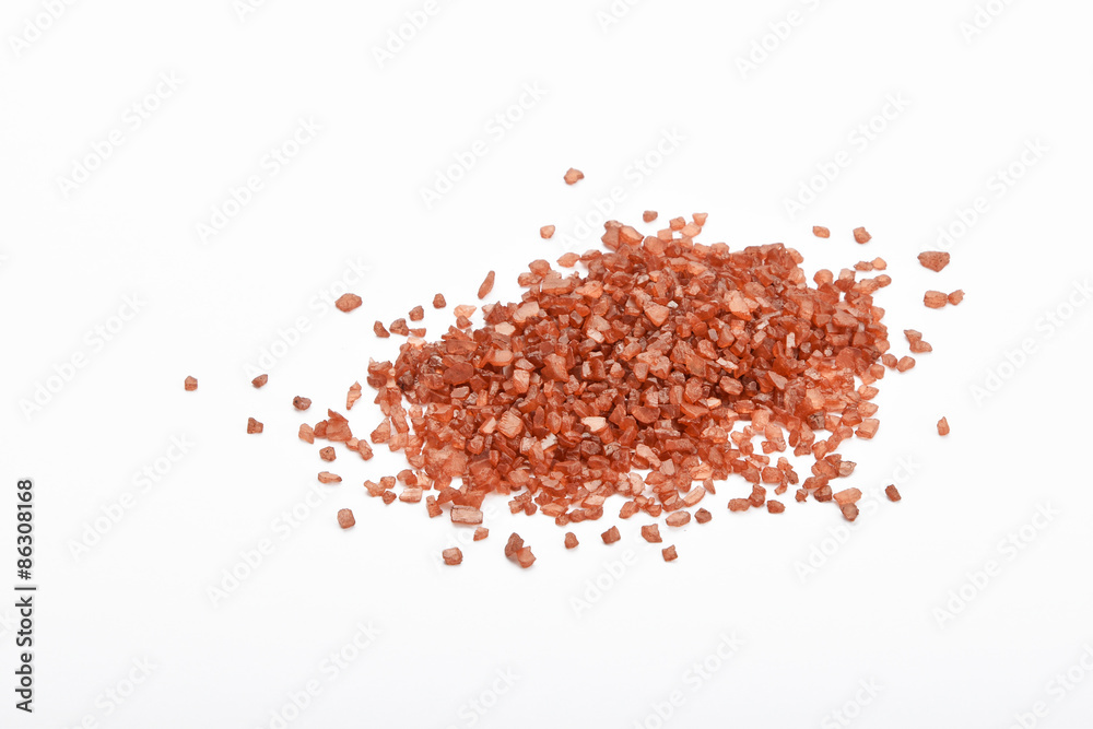 Handful of red Hawaiian sea salt isolated on white Handful of red Hawaiian sea salt isolated on white